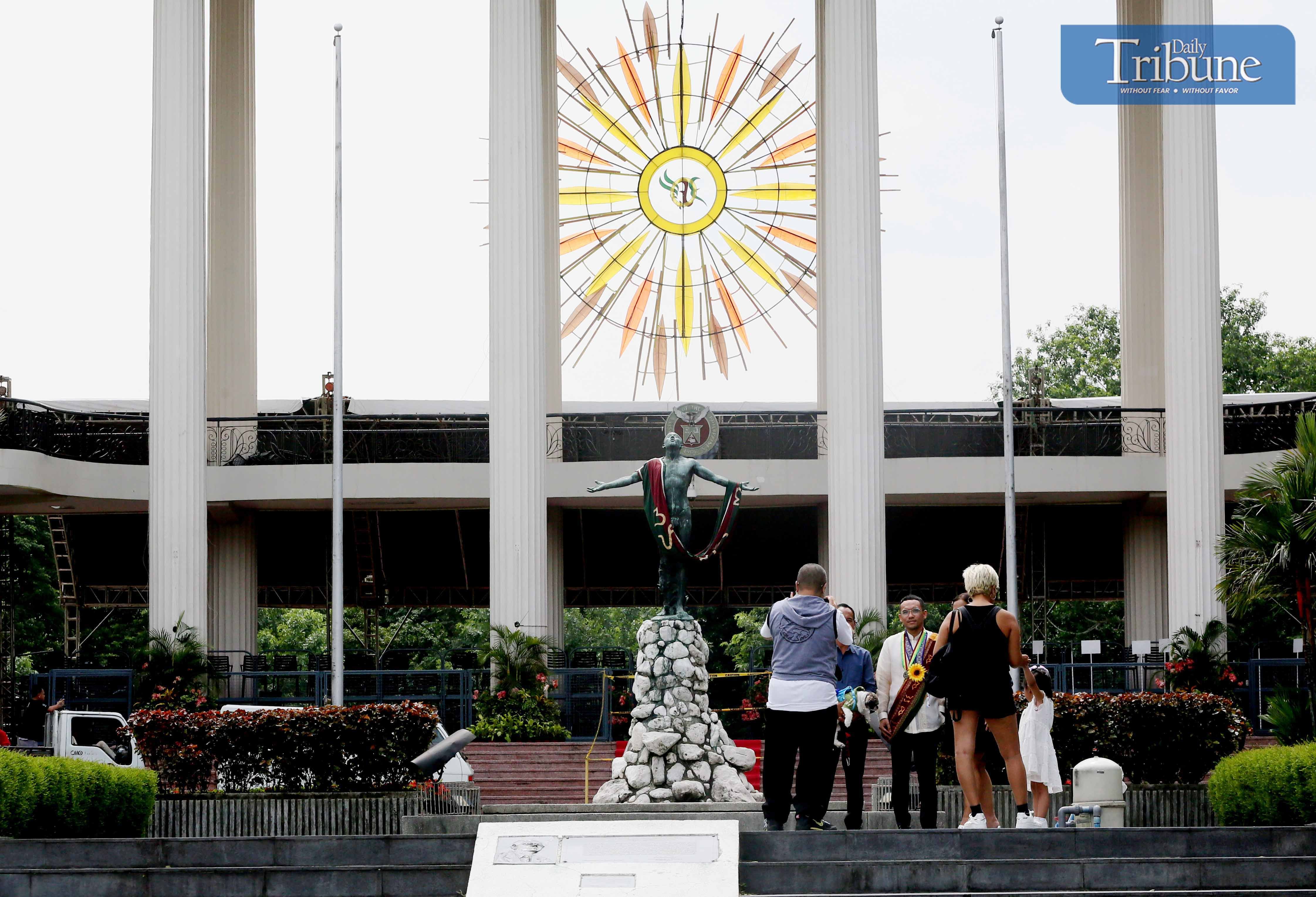 LOOK: Graduating students from the University of the Philippines (UP) in Diliman, Quezon City, gather at the Oblation statue on Saturday, 27 July 2024, for commemorative photos ahead of their upcoming graduation.